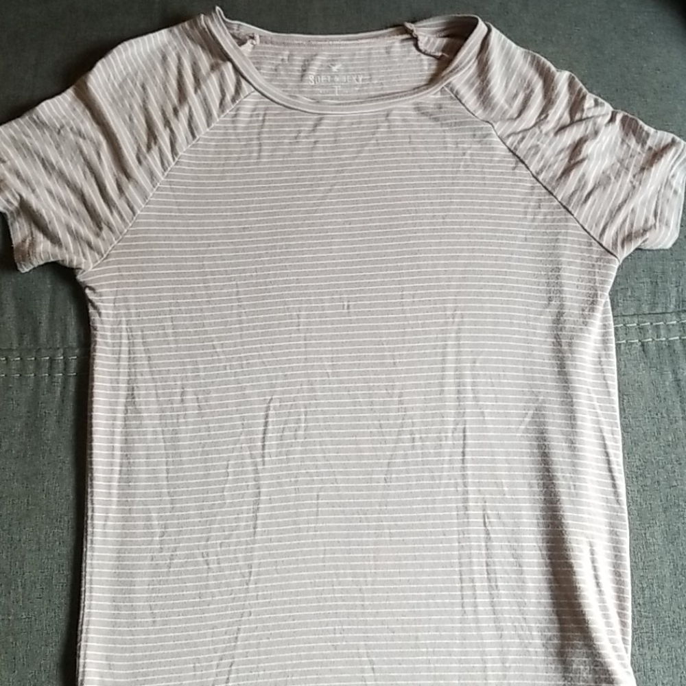 Pink and white american eagle shirt